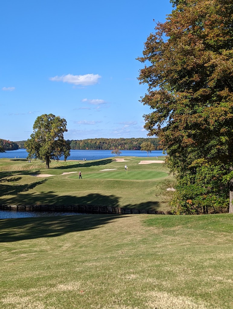Panoramic view of a lush green golf course at Bryan Park. Smooth