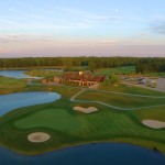 Panoramic view of a lush green golf course at Bucks Run Golf Club. Smooth