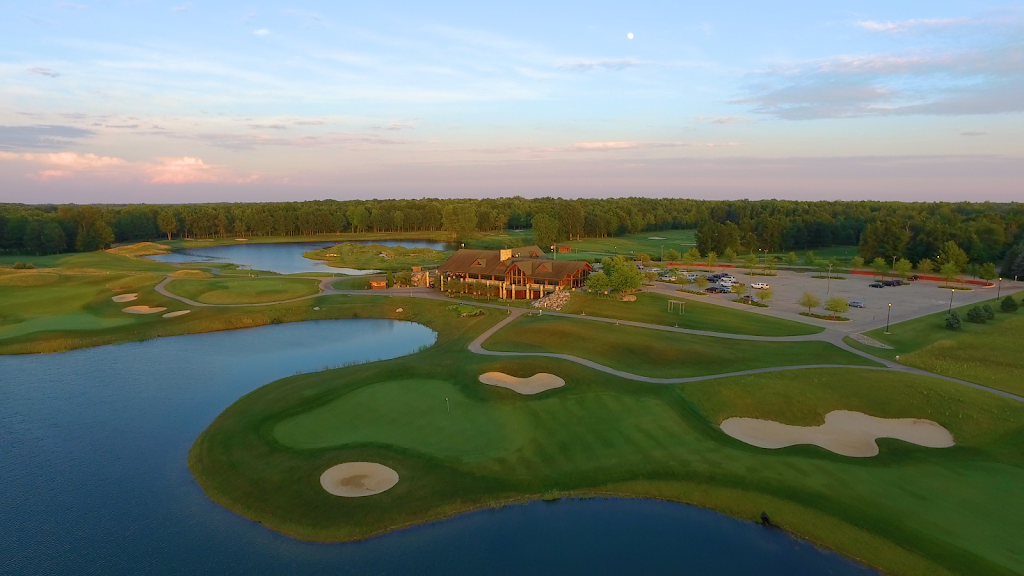 Panoramic view of a lush green golf course at Bucks Run Golf Club. Smooth