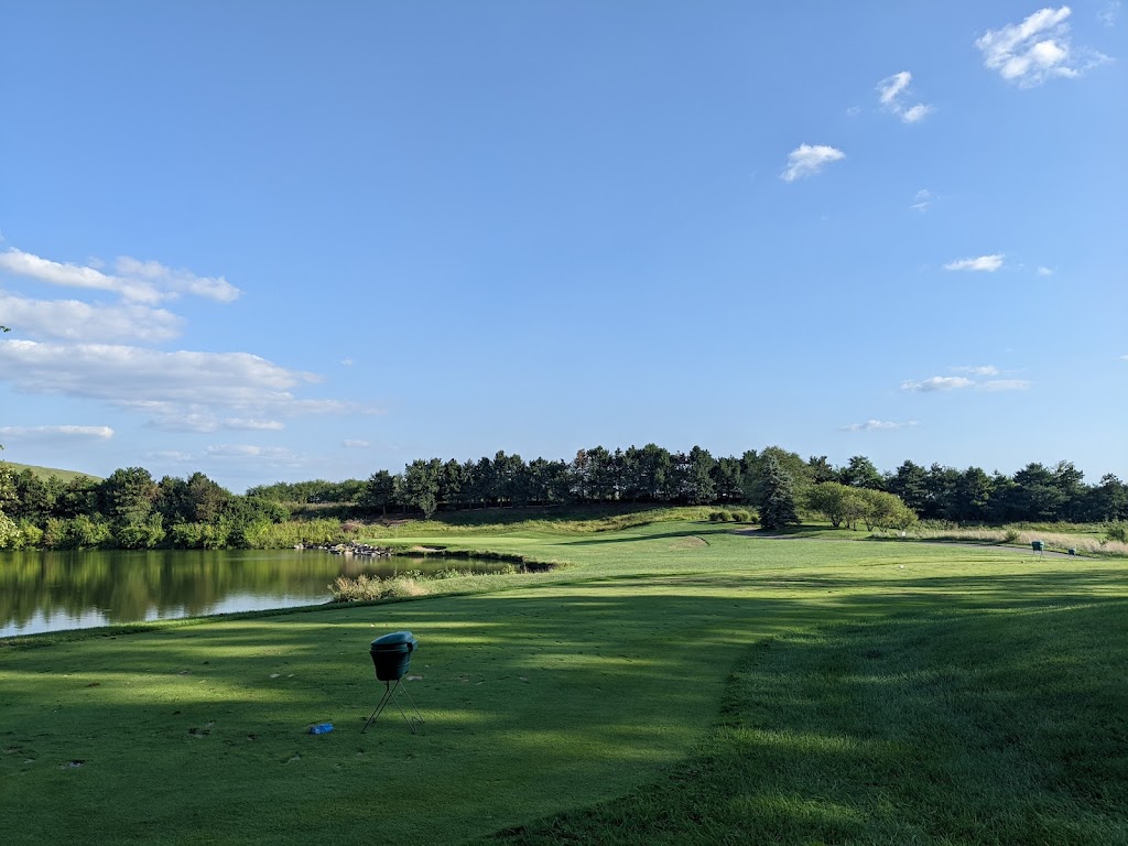 Panoramic view of a lush green golf course at Buffer Park Golf Course. Smooth