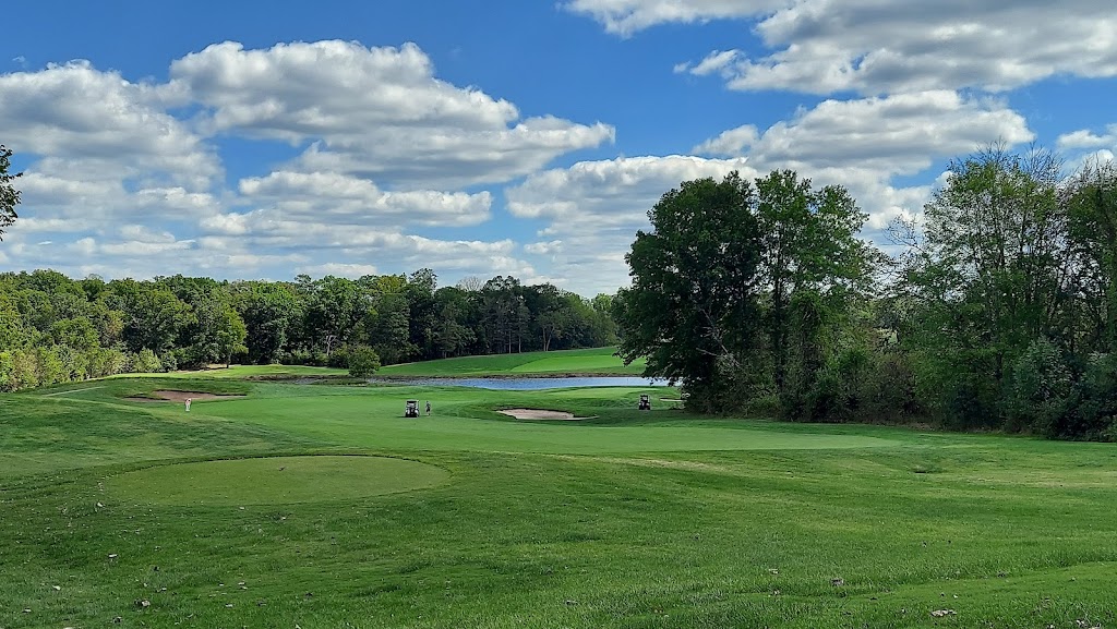Panoramic view of a lush green golf course at Bull Run Golf Club. Smooth