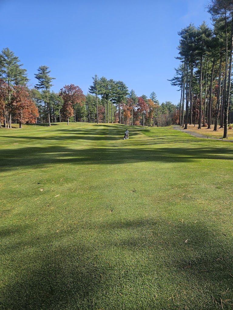 Panoramic view of a lush green golf course at Butter Brook Golf Club. Smooth