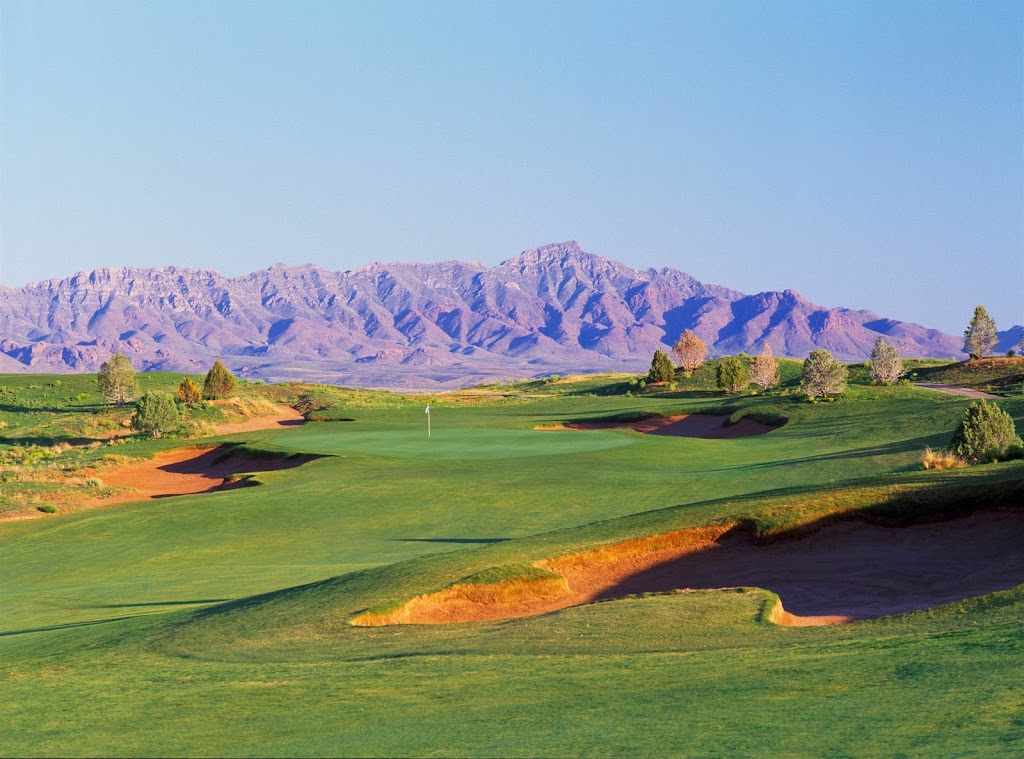 Panoramic view of a lush green golf course at Butterfield Trail Golf Club. Smooth