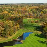 Panoramic view of a lush green golf course at Cantigny Golf. Smooth