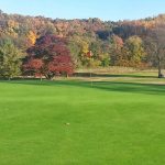 Panoramic view of a lush green golf course at Cape Jaycee Municipal Golf Course. Smooth