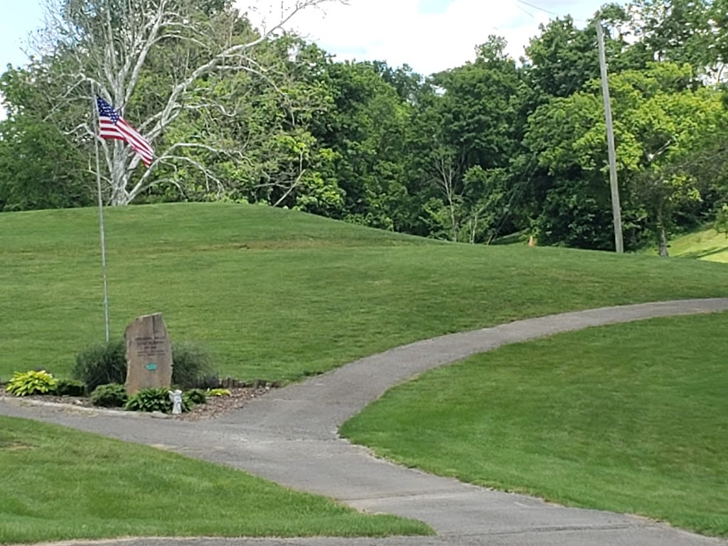 Panoramic view of a lush green golf course at Cardinal Hills Golf Course. Smooth