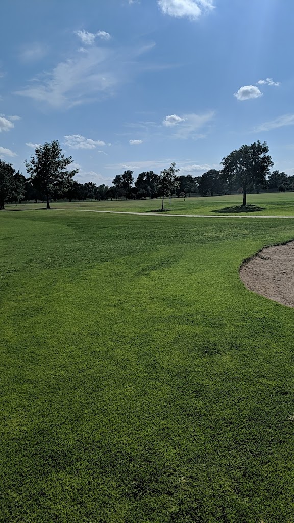 Panoramic view of a lush green golf course at Carey Park Golf Course. Smooth
