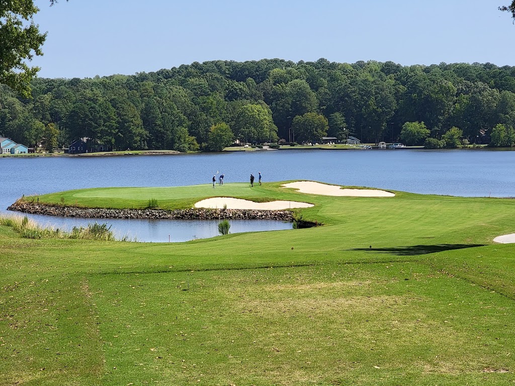 Panoramic view of a lush green golf course at Carolina Trace Country Club. Smooth