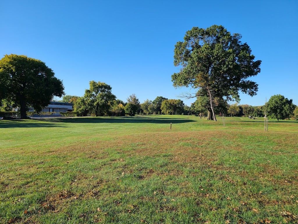 Panoramic view of a lush green golf course at Carroll Park Golf Course. Smooth