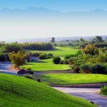 Panoramic view of a lush green golf course at CasaBlanca Golf Club. Smooth