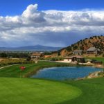 Panoramic view of a lush green golf course at Cedar Ridge Golf Course. Smooth