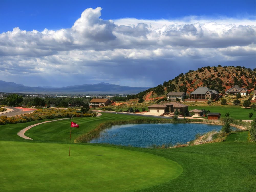 Panoramic view of a lush green golf course at Cedar Ridge Golf Course. Smooth