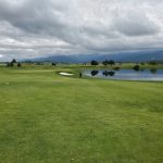 Panoramic view of a lush green golf course at Centennial Golf Club. Smooth