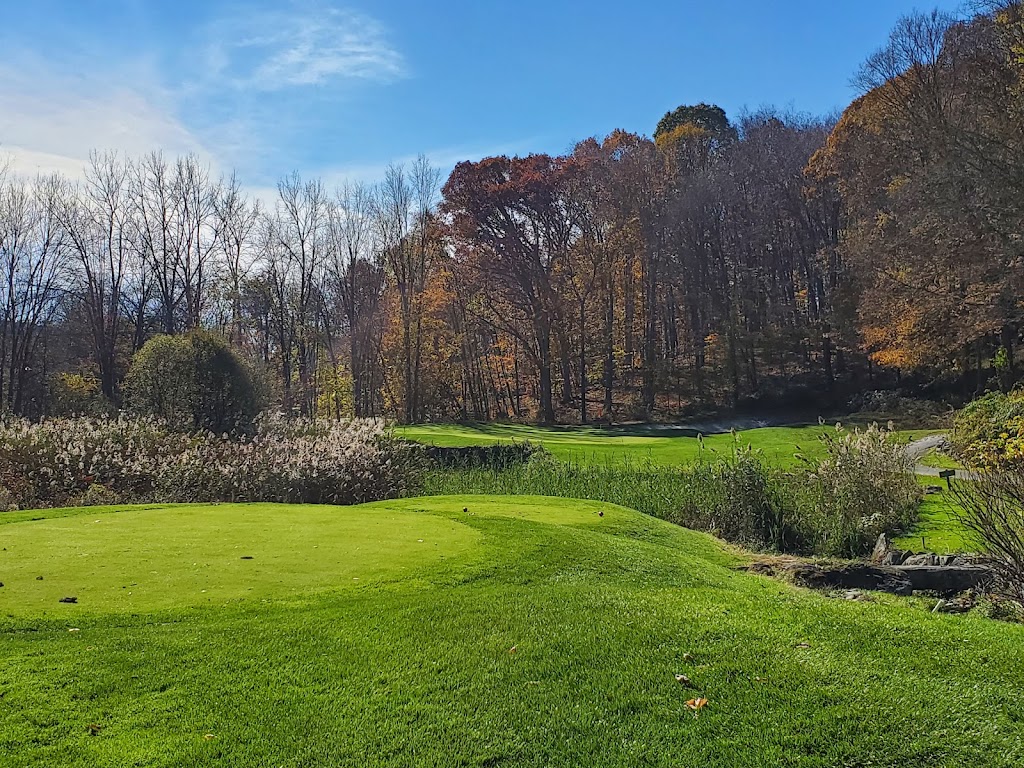 Panoramic view of a lush green golf course at Centennial Golf Club. Smooth