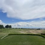 Panoramic view of a lush green golf course at Centennial Golf Course. Smooth