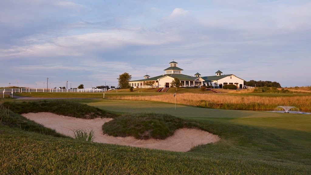 Panoramic view of a lush green golf course at Chariot Run Golf Club. Smooth
