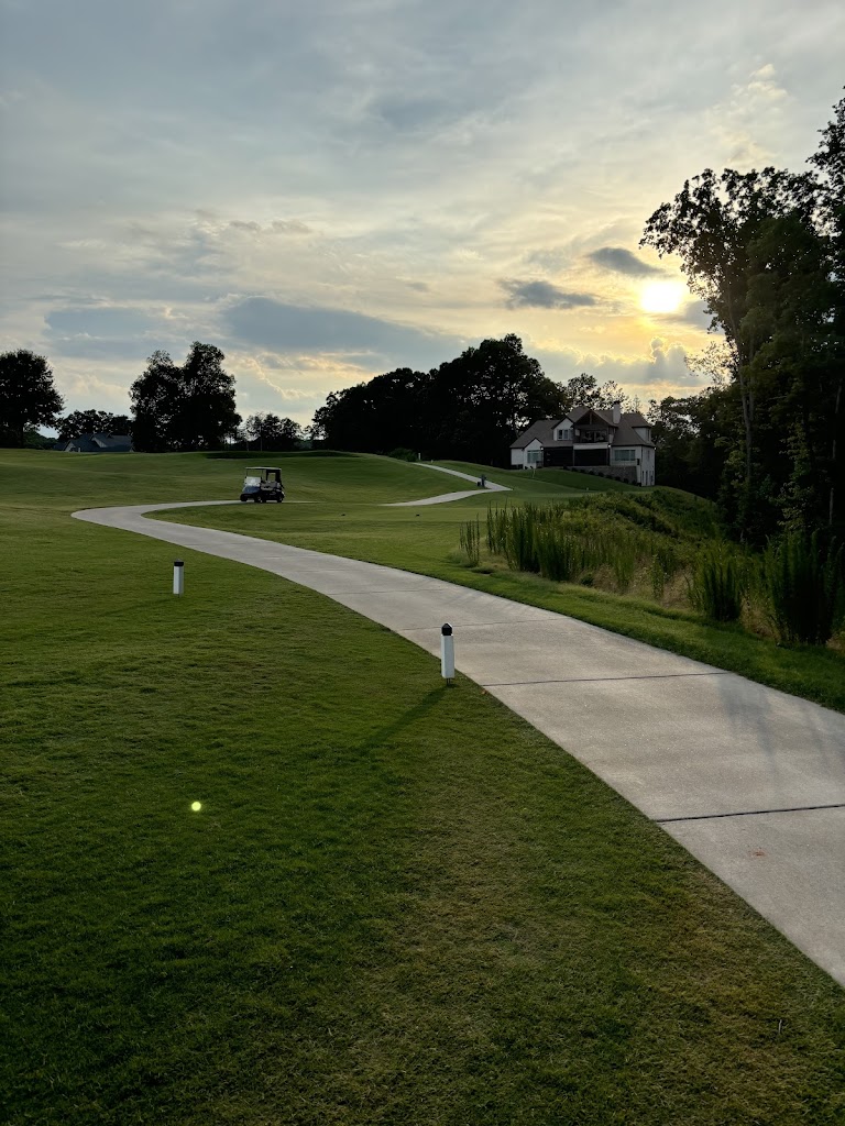 Panoramic view of a lush green golf course at Chattahoochee Golf Club. Smooth