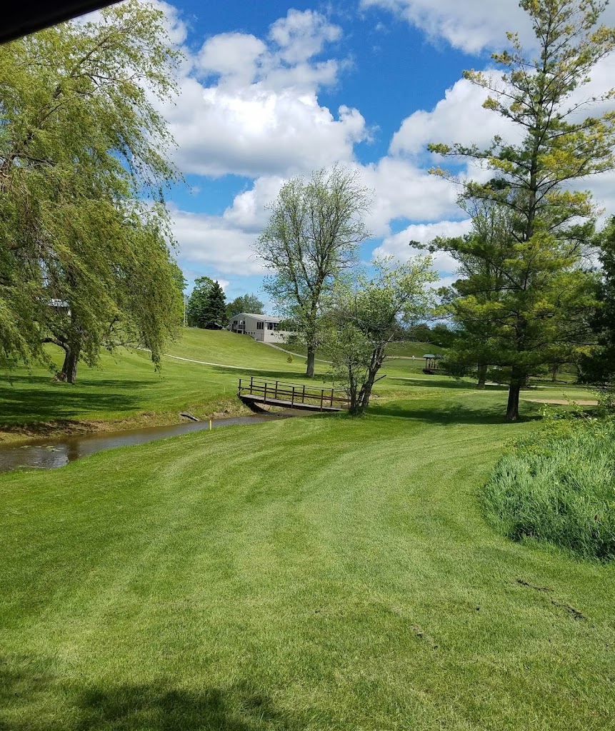 Panoramic view of a lush green golf course at Cheboygan Golf & Country Club. Smooth