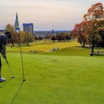 green grass with the flag in the hole.
