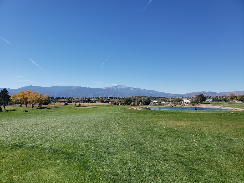 Panoramic view of a lush green golf course at Cherokee Ridge Golf Course. Smooth