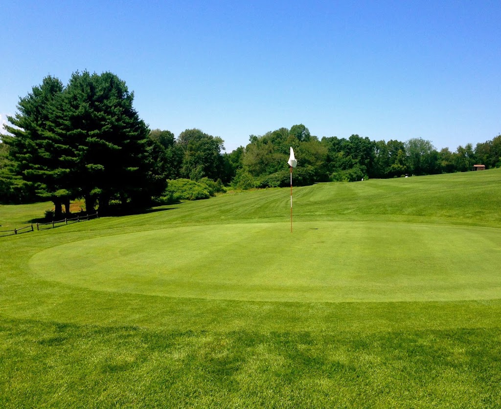 Panoramic view of a lush green golf course at Cherry Hill Golf Course. Smooth