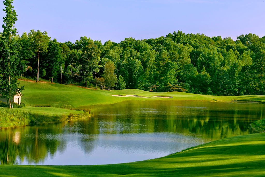 Panoramic view of a lush green golf course at Chestatee Golf Club. Smooth