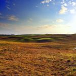 Panoramic view of a lush green golf course at Chicago Highlands Club. Smooth
