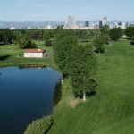 Panoramic view of a lush green golf course at City Park Golf Course. Smooth