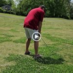 green grass with the flag in the hole.