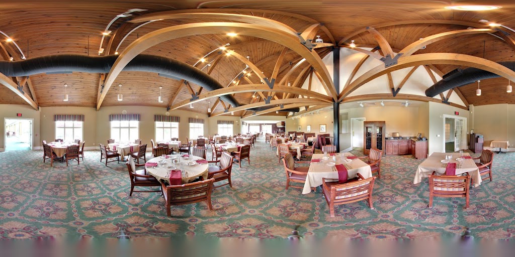 Panoramic view of a lush green golf course at Clarksville Country Club. Smooth