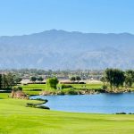 Panoramic view of a lush green golf course at Classic Club. Smooth