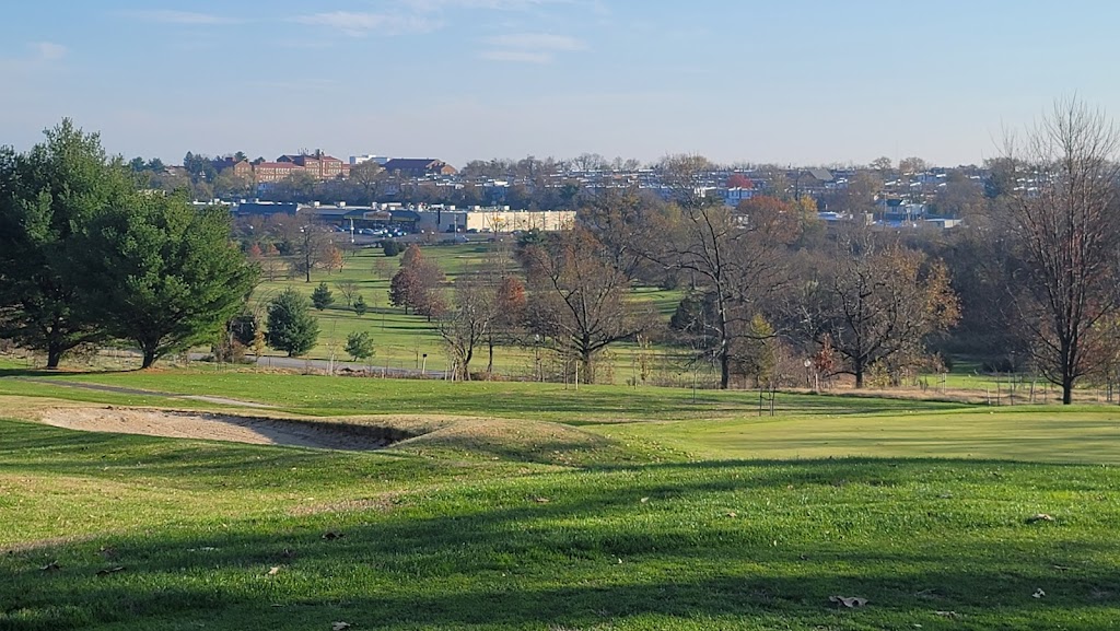 Panoramic view of a lush green golf course at Clifton Park Golf Course. Smooth