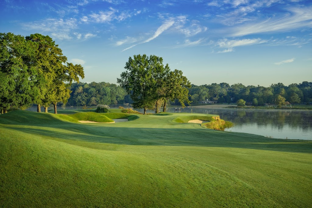 Panoramic view of a lush green golf course at Cobblestone Golf Course. Smooth