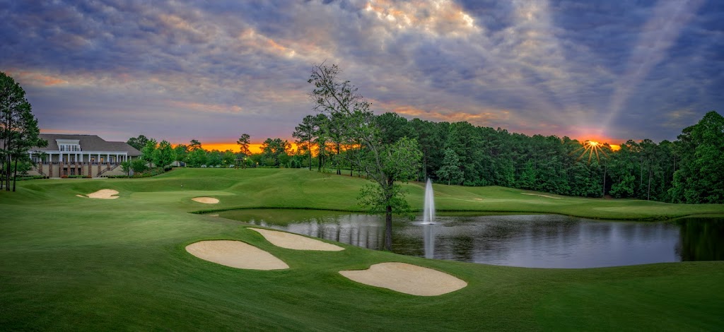 Panoramic view of a lush green golf course at Cobblestone Park Golf Club. Smooth