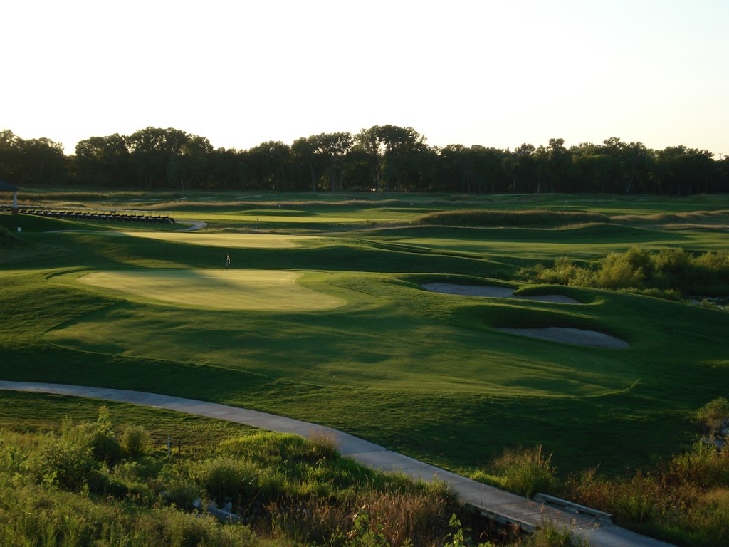 Panoramic view of a lush green golf course at Coldwater Golf Links. Smooth