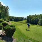 Panoramic view of a lush green golf course at Colonial Heritage Club. Smooth