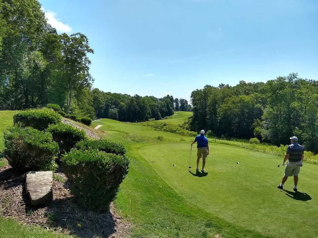 Panoramic view of a lush green golf course at Colonial Heritage Club. Smooth