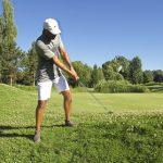 Panoramic view of a lush green golf course at Colwood Golf Center. Smooth