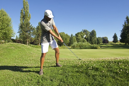Panoramic view of a lush green golf course at Colwood Golf Center. Smooth