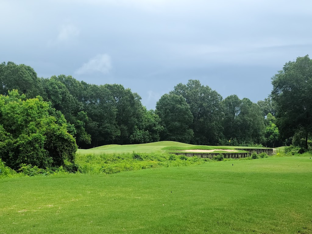Panoramic view of a lush green golf course at Copper Mill Golf Club. Smooth