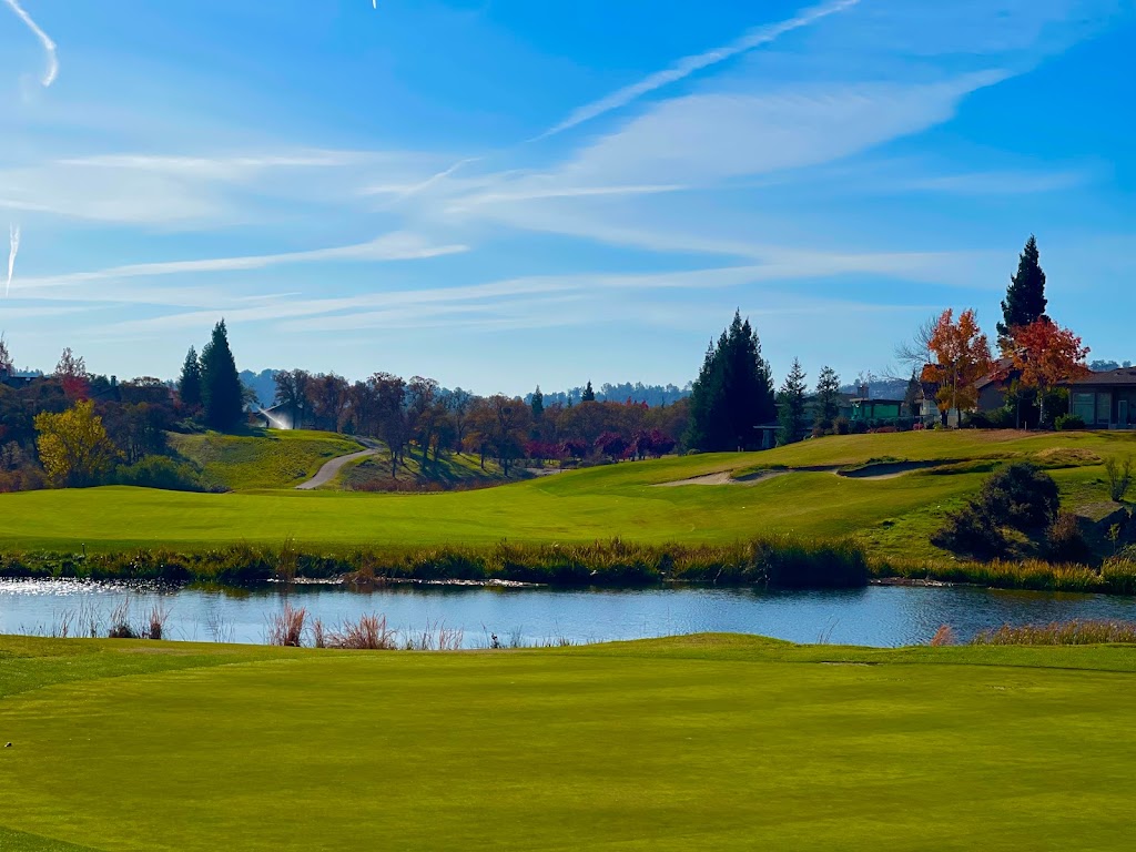 Panoramic view of a lush green golf course at Copper Valley Golf Club. Smooth