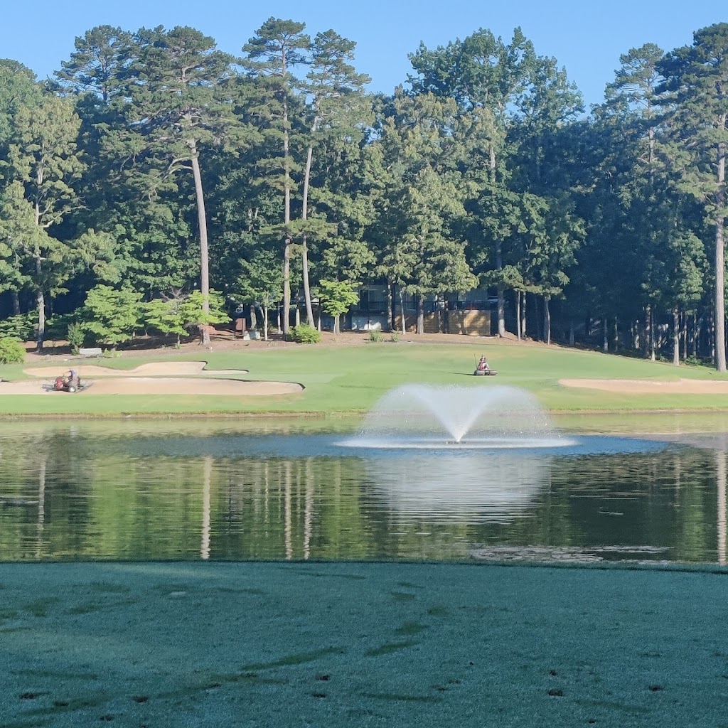 Panoramic view of a lush green golf course at Cortez Golf Course. Smooth