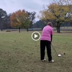 green grass with the flag in the hole.