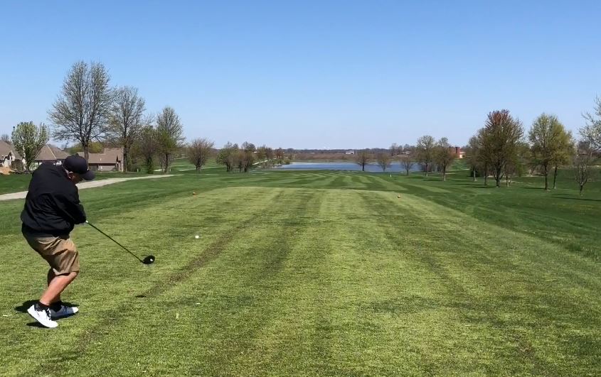 Panoramic view of a lush green golf course at Country Creek Golf Club. Smooth