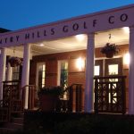 Panoramic view of a lush green golf course at Country Hills Golf Club. Smooth