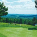 Panoramic view of a lush green golf course at Country View Golf Club. Smooth