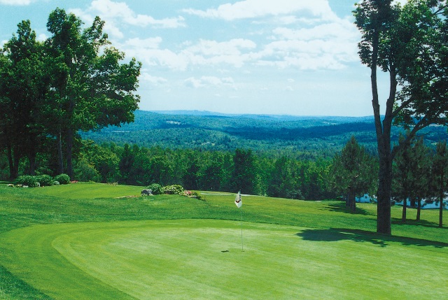 Panoramic view of a lush green golf course at Country View Golf Club. Smooth
