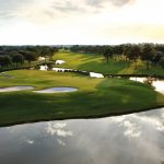 Panoramic view of a lush green golf course at Craft Farms Golf Club. Smooth