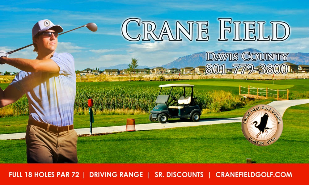 Panoramic view of a lush green golf course at Crane Field Golf Course and Driving Range. Smooth