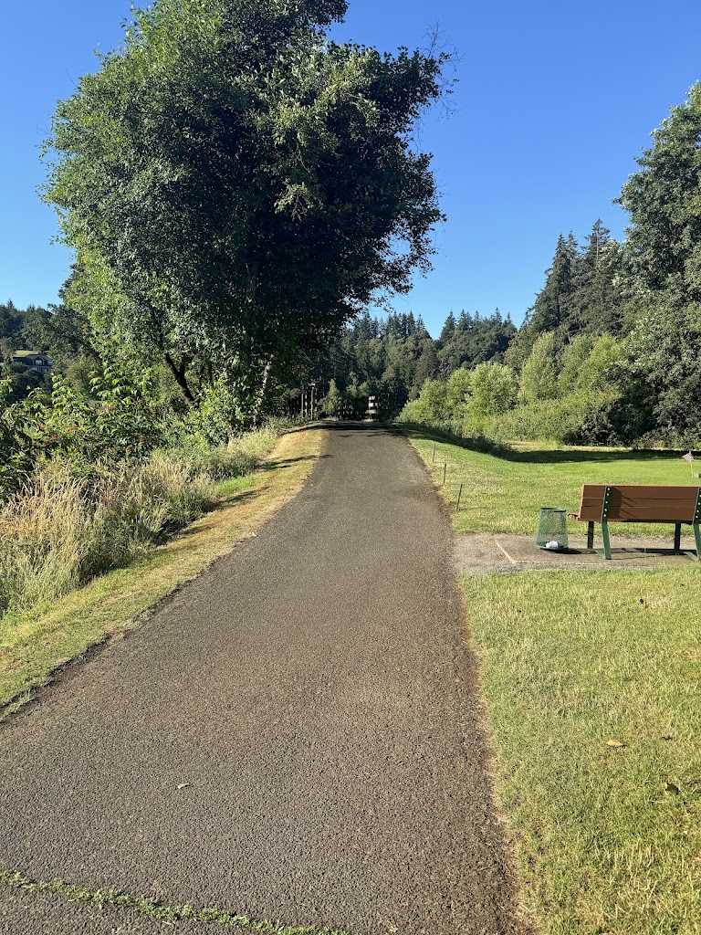 Panoramic view of a lush green golf course at Creekside Golf Club. Smooth